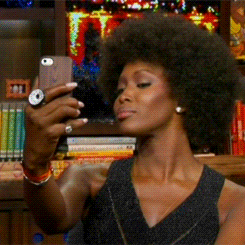 GIF of Naomi Capmbell taking a selfie on Bravo&#x27;s WWHL