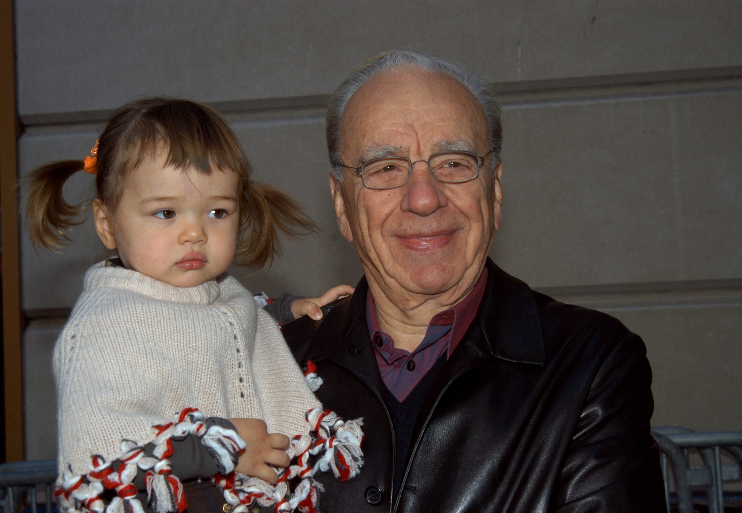 Rupert Murdoch holding his daughter