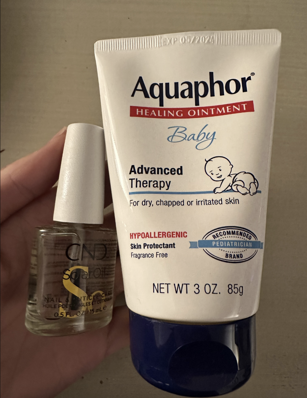 a picture of cuticle oil and aquaphor