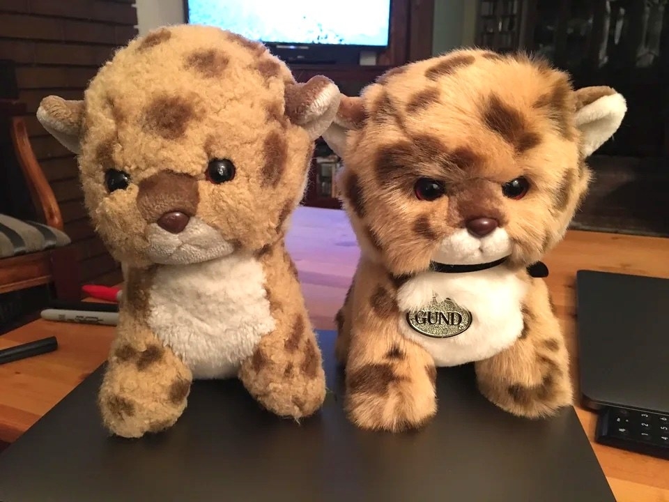 Two stuffed toy cats