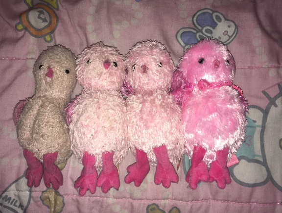 Stuffed toys on a bed