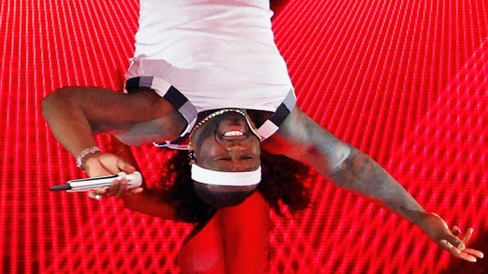 50 Cent hanging upside down