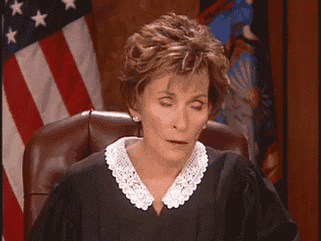 Judge Judy shaking her head and rolling her eyes
