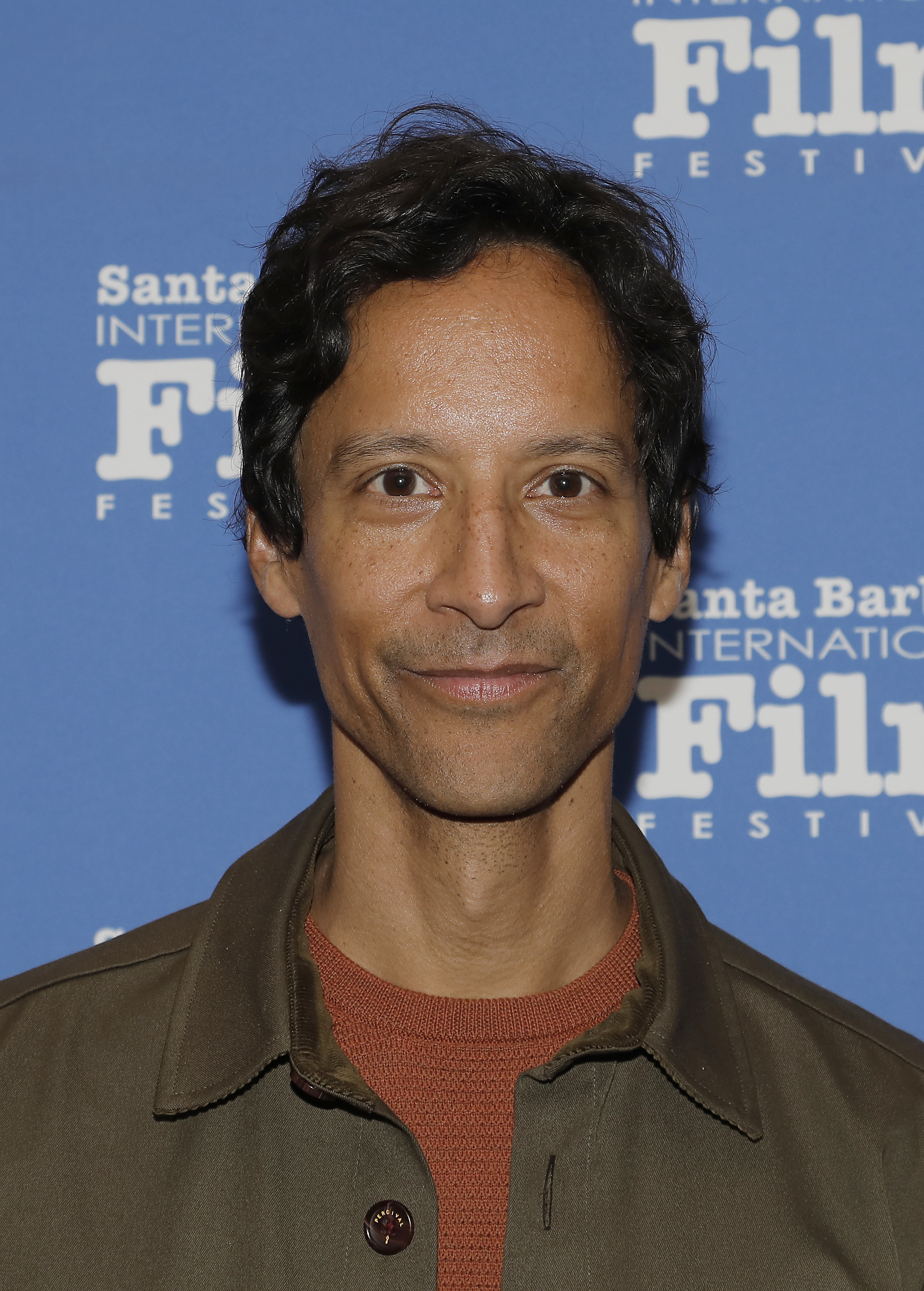 Close-up of Danny Pudi