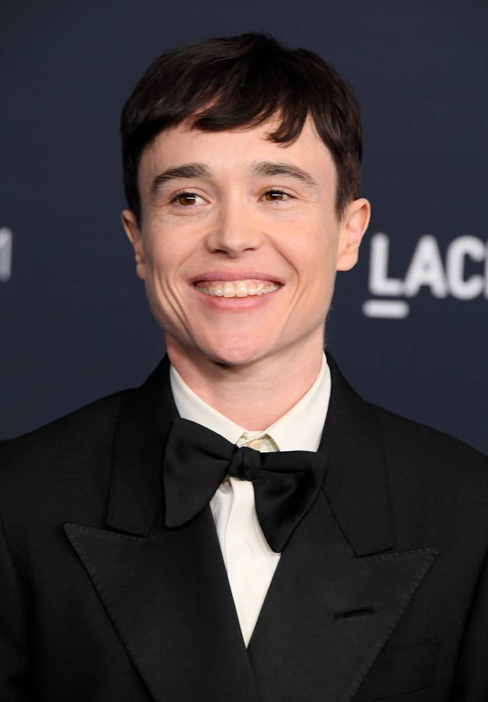 Close-up of Elliot smiling in a suit and bow tie