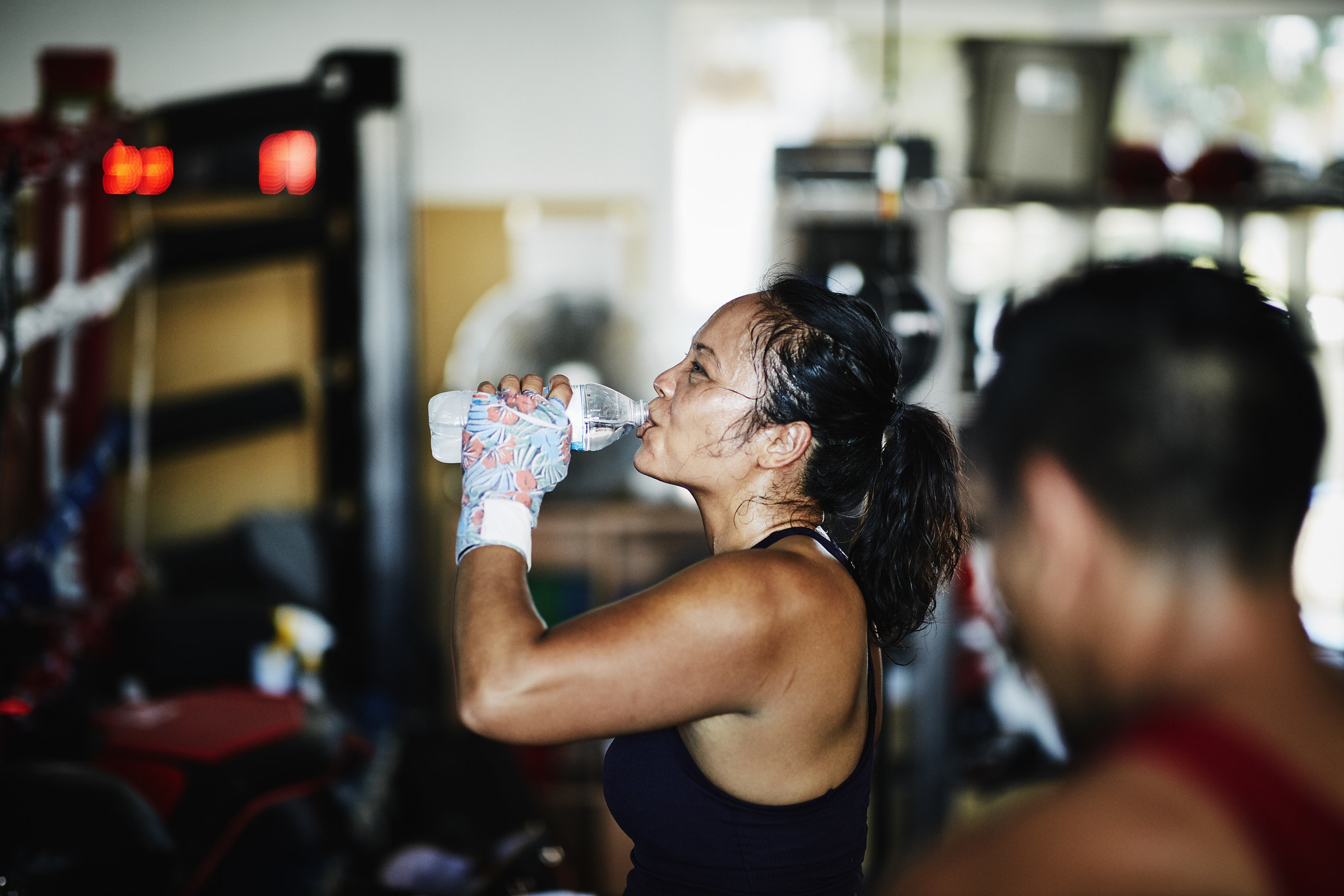 Woman sweating at gym