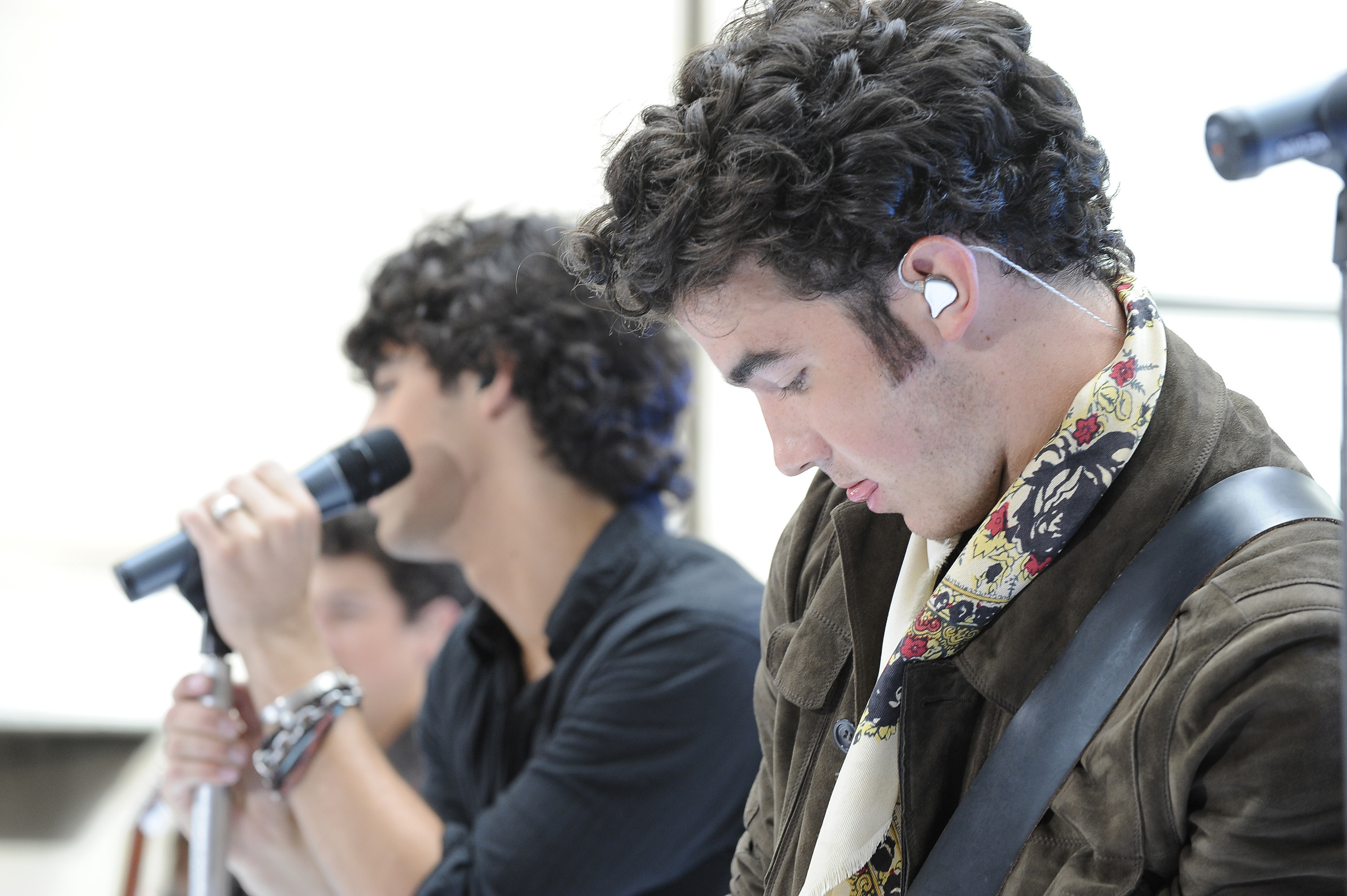 The brothers performing in profile