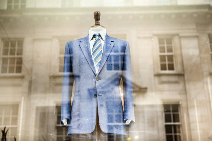 A suit in a store window