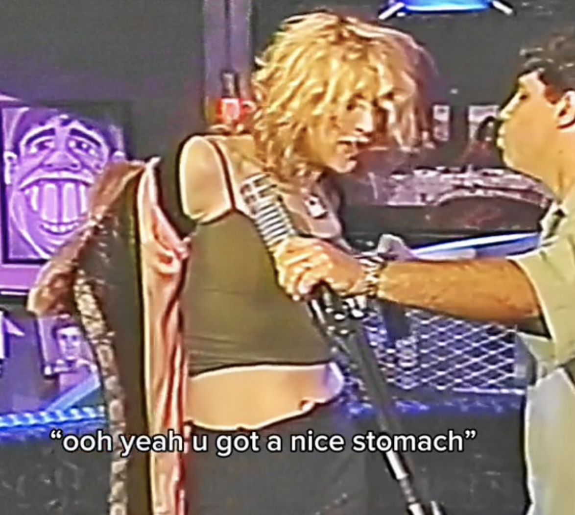 Courtney Love removing her jacket