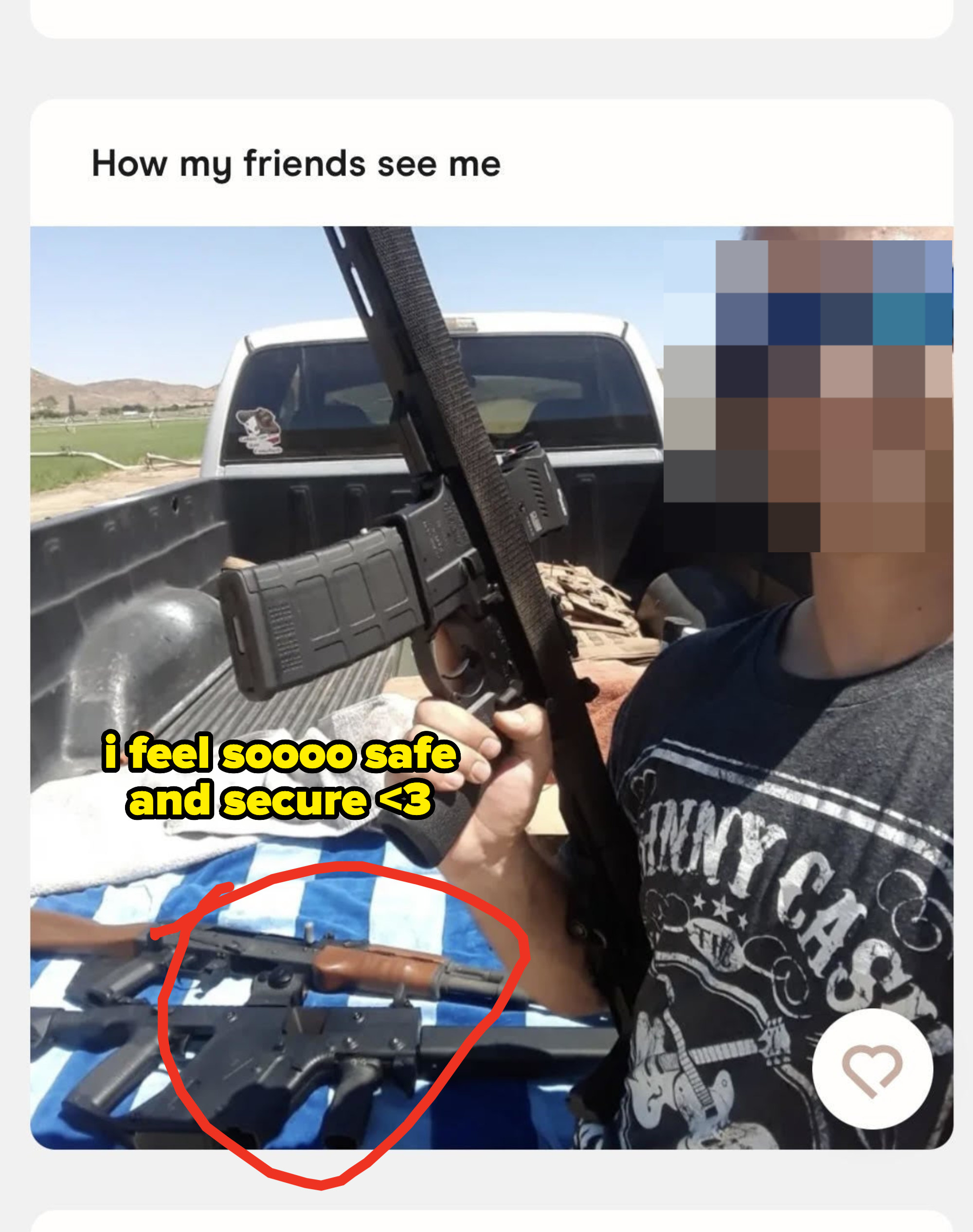 A photo of a guy holding guns