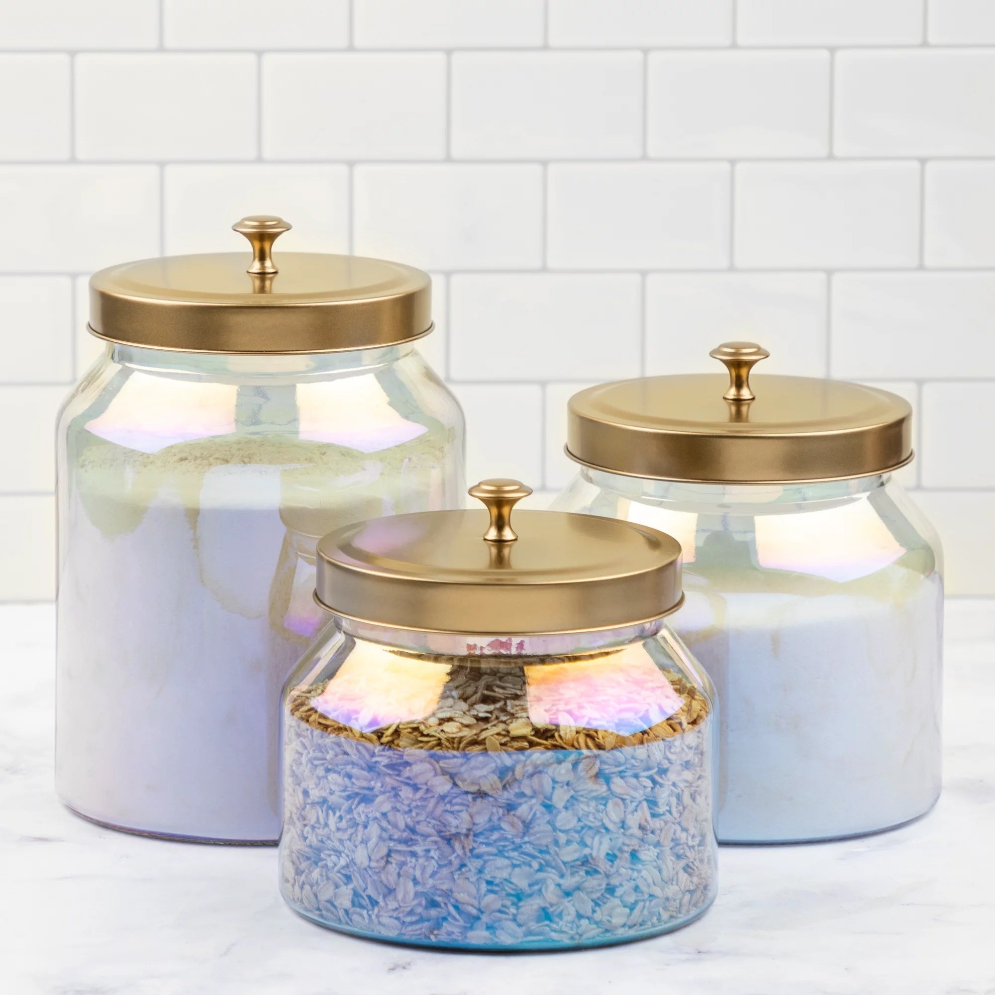 Three-piece rainbow jar set with gold lids