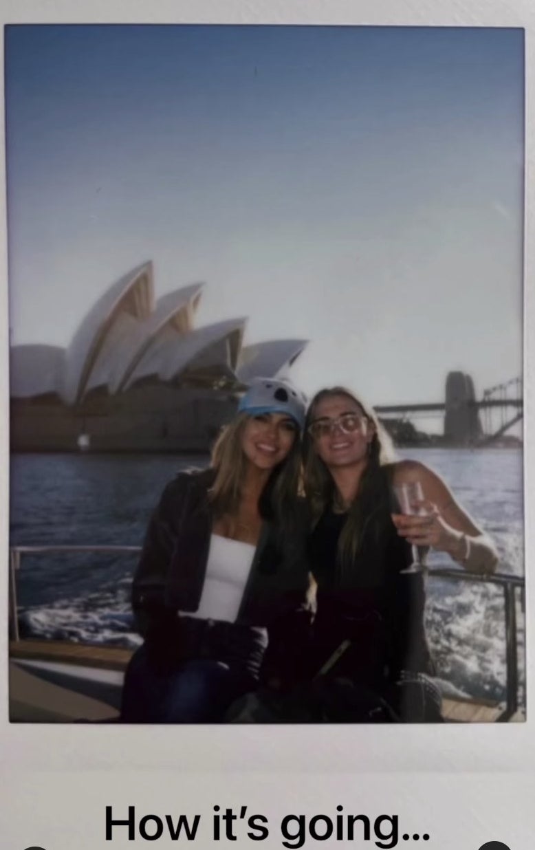 A polaroid photo of the pair in front of the Sydney Opera House shared in the video
