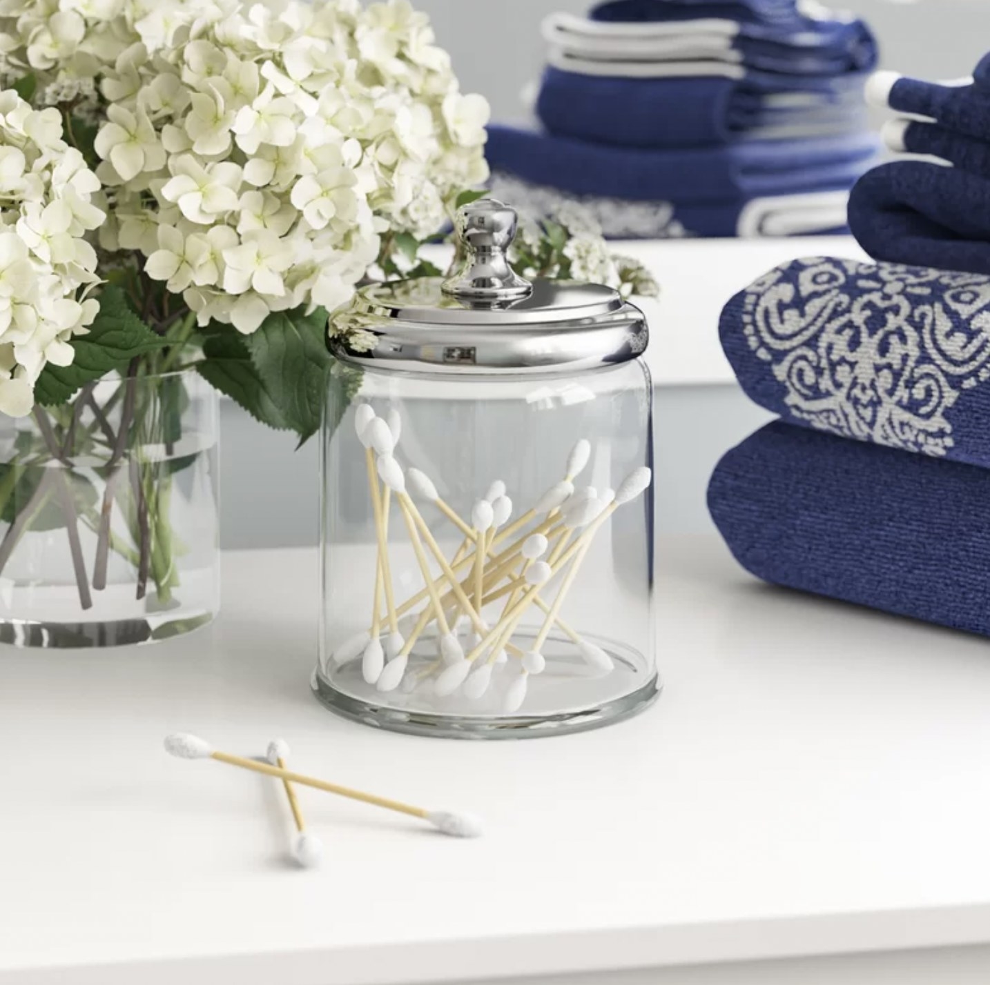 the glass canister with q-tips