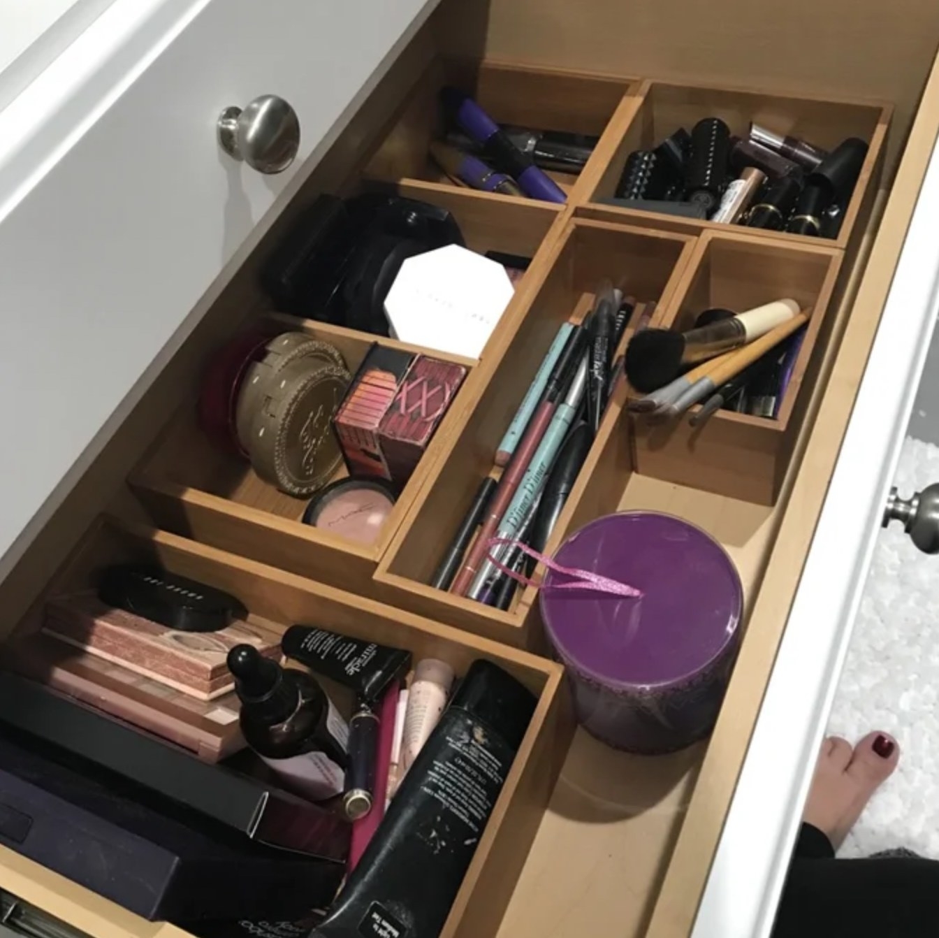 Reviewer's bathroom drawer organized with the wooden dividers