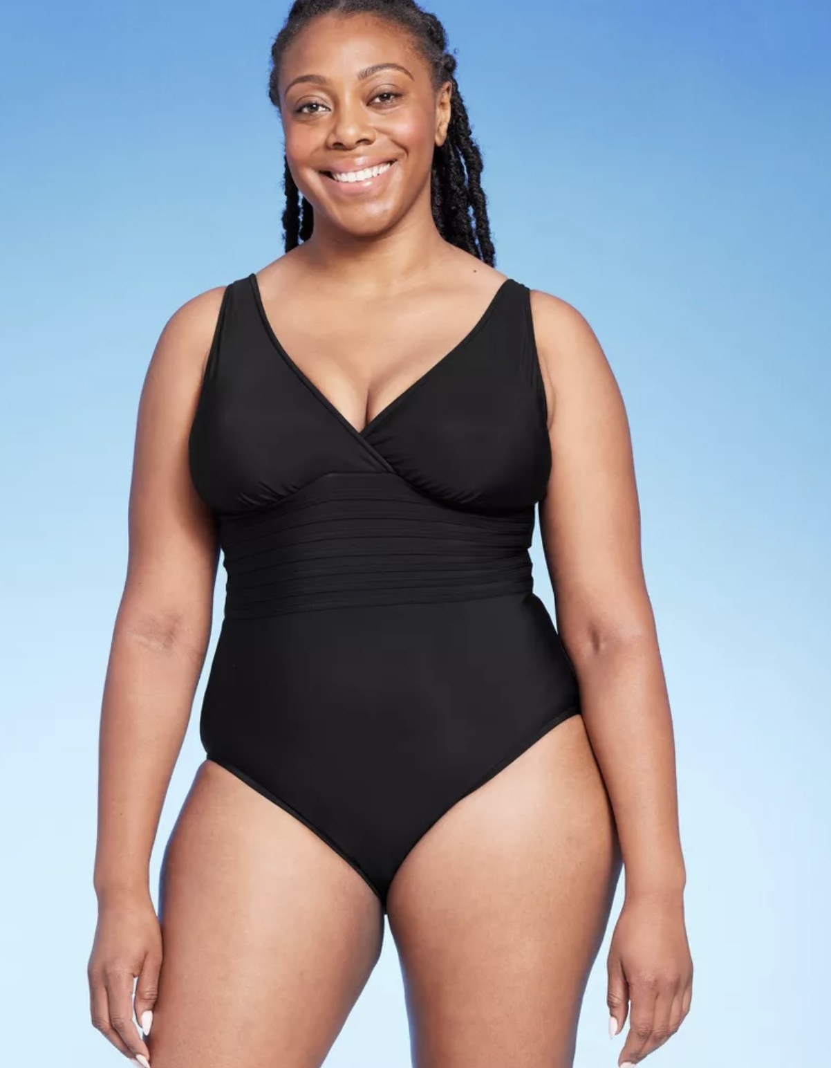 a model wearing the bathing suit in black
