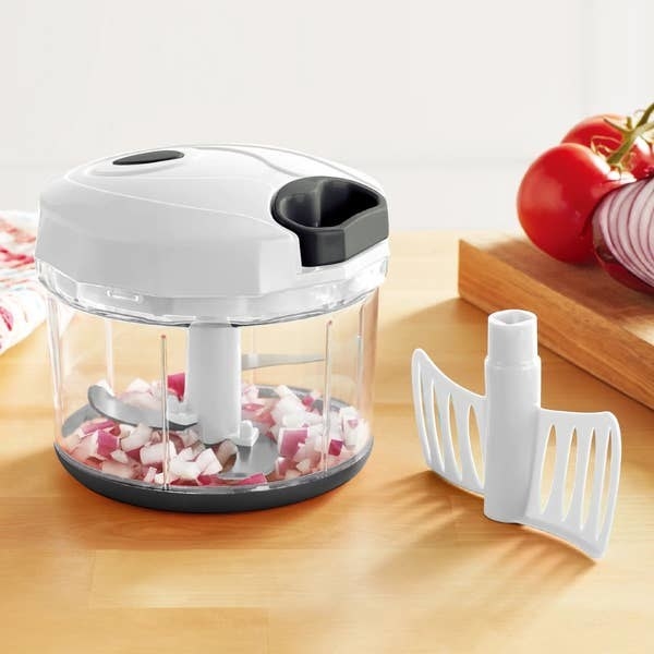 the food chopper with diced onions inside