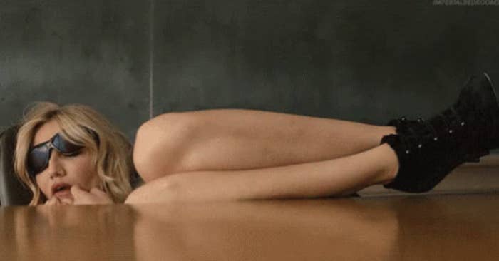 Cameron Diaz in "Bad Teacher" sleeping and curled up at a desk