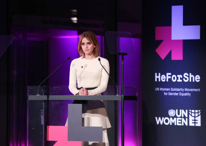 Emma onstage at a podium for HeForShe