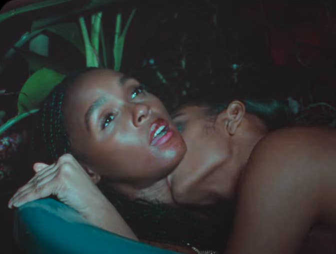 A person kissing Janelle&#x27;s neck