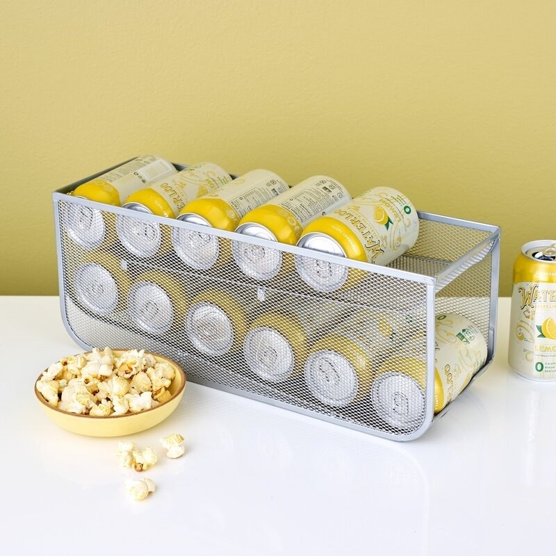 the silver can dispenser with lemonade cans