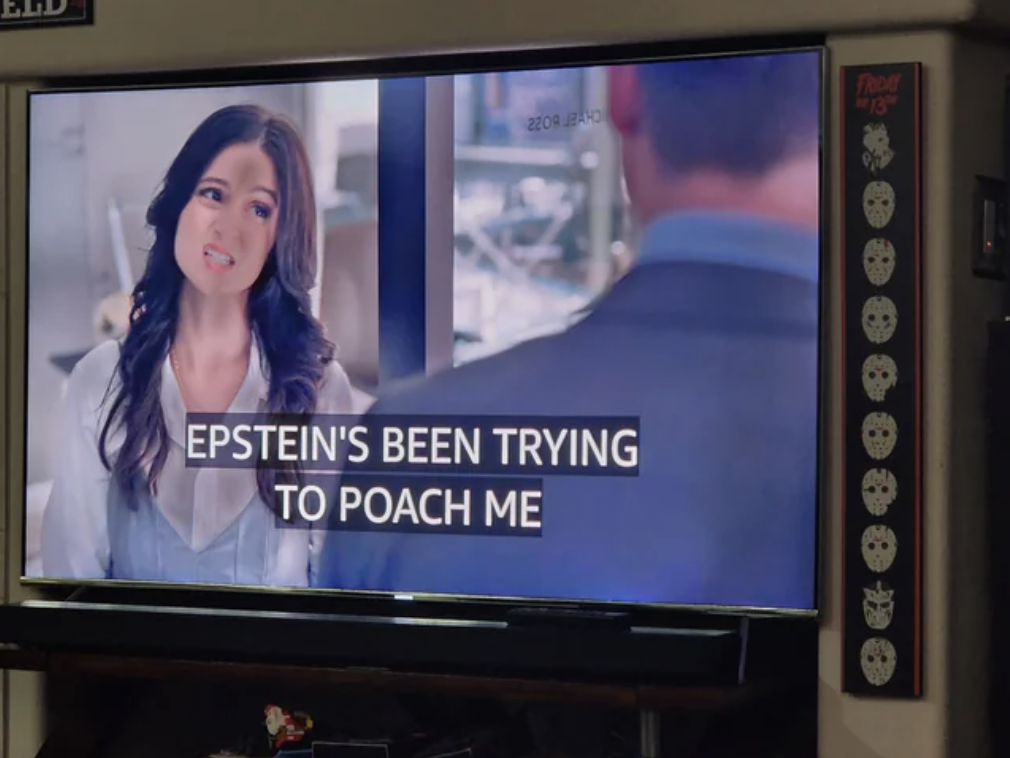 Screenshot with closed caption, &quot;Epstein&#x27;s been trying to poach me&quot;