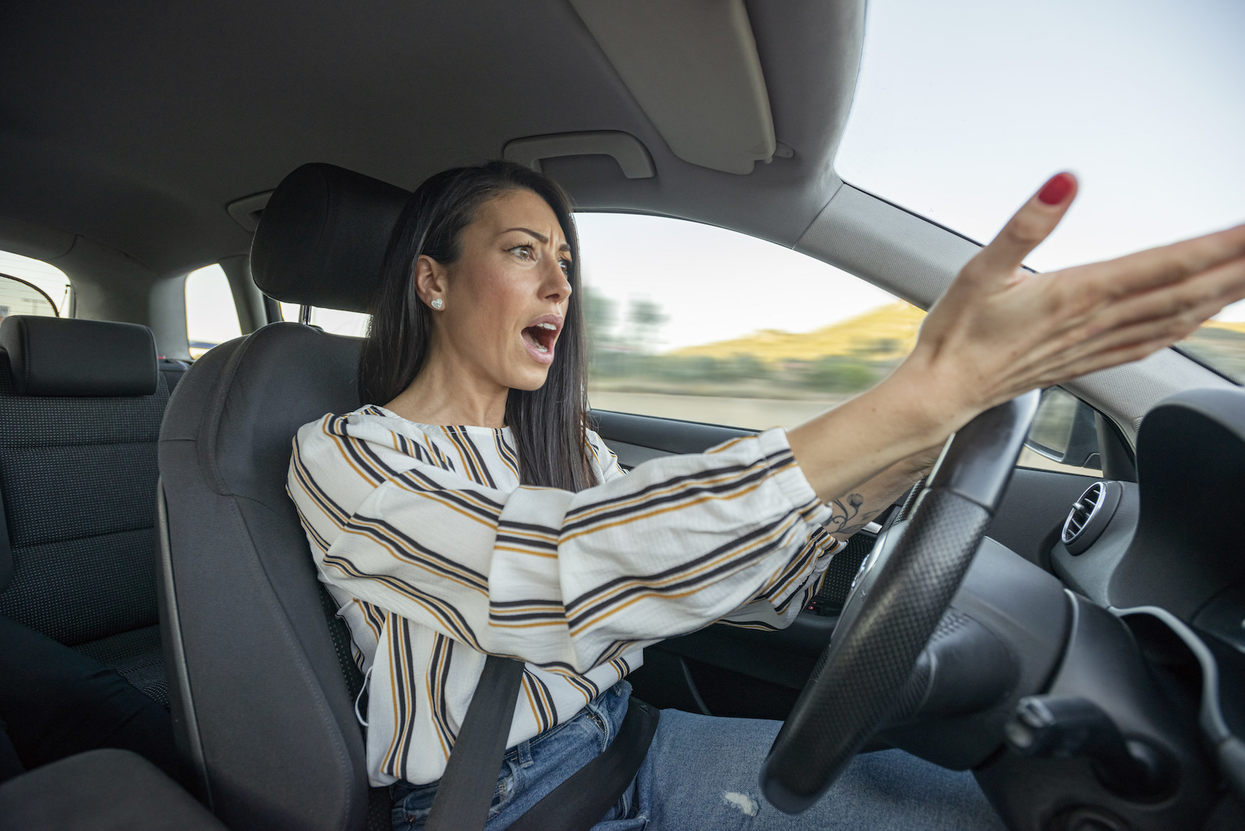 A woman getting angry while driving