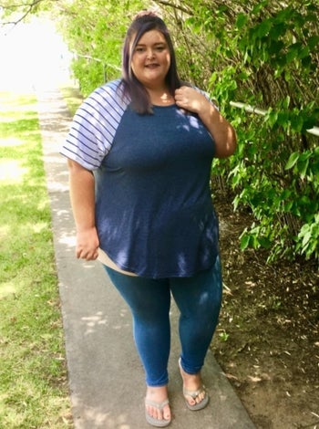 Reviewer wearing the navy blue top