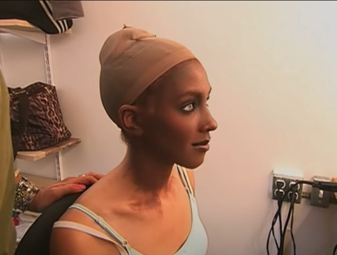 Model getting makeup done with excessive tanning to change her ethnicity in &quot;America&#x27;s Next Top Model&quot;