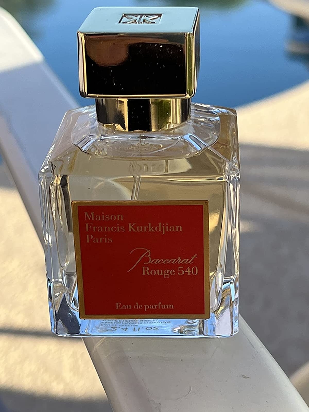 A reviewer&#x27;s bottle of perfume