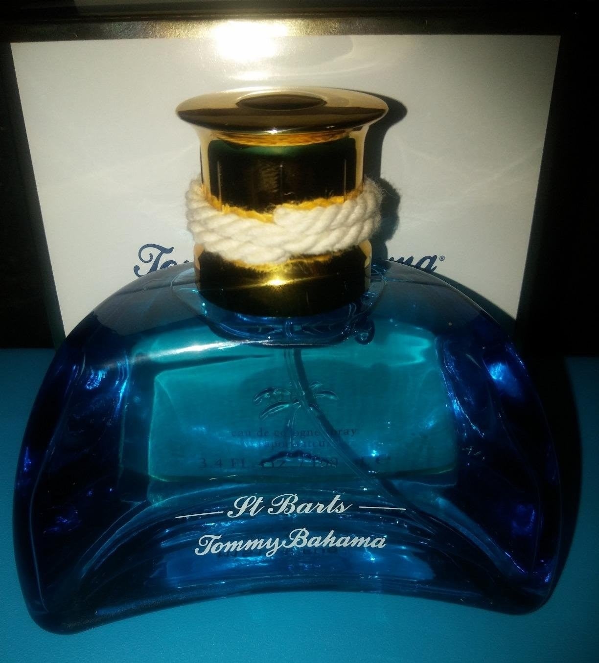 A blue bottle of perfume in a reviewer&#x27;s home
