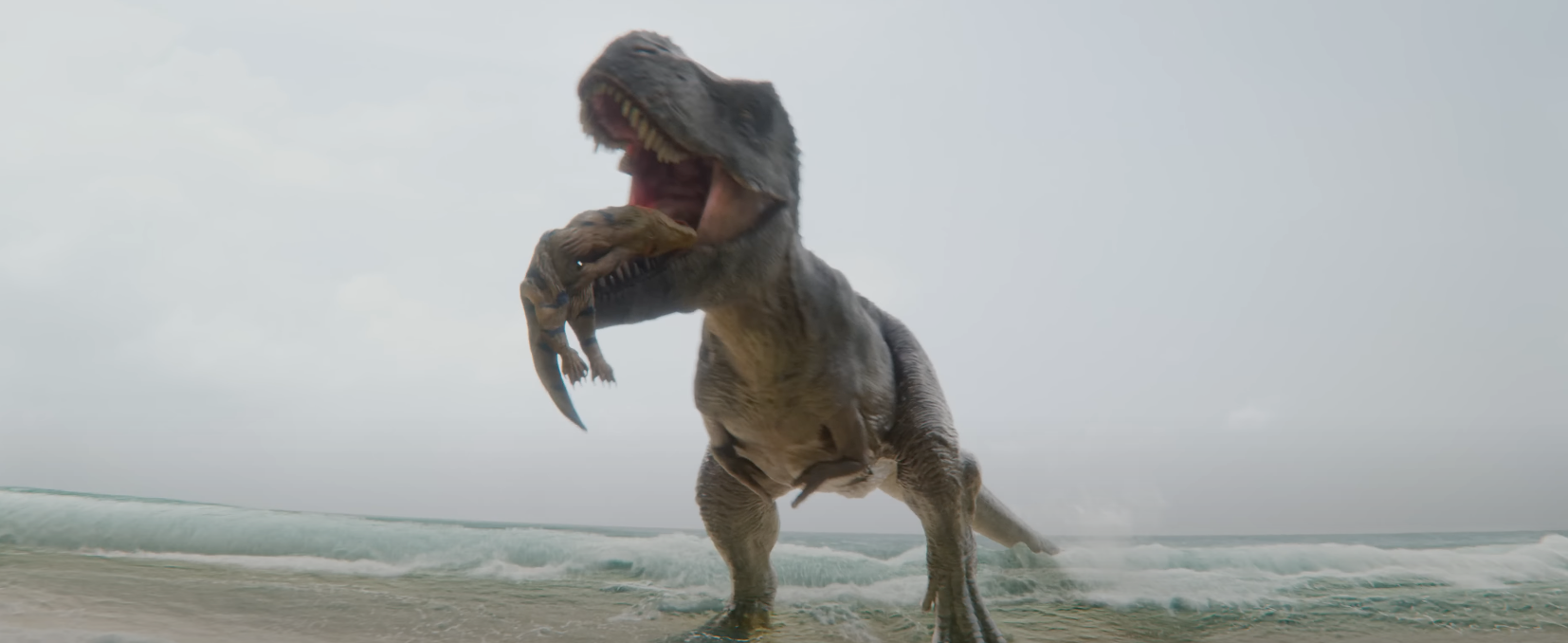 A T-Rex eats a fish from the ocean