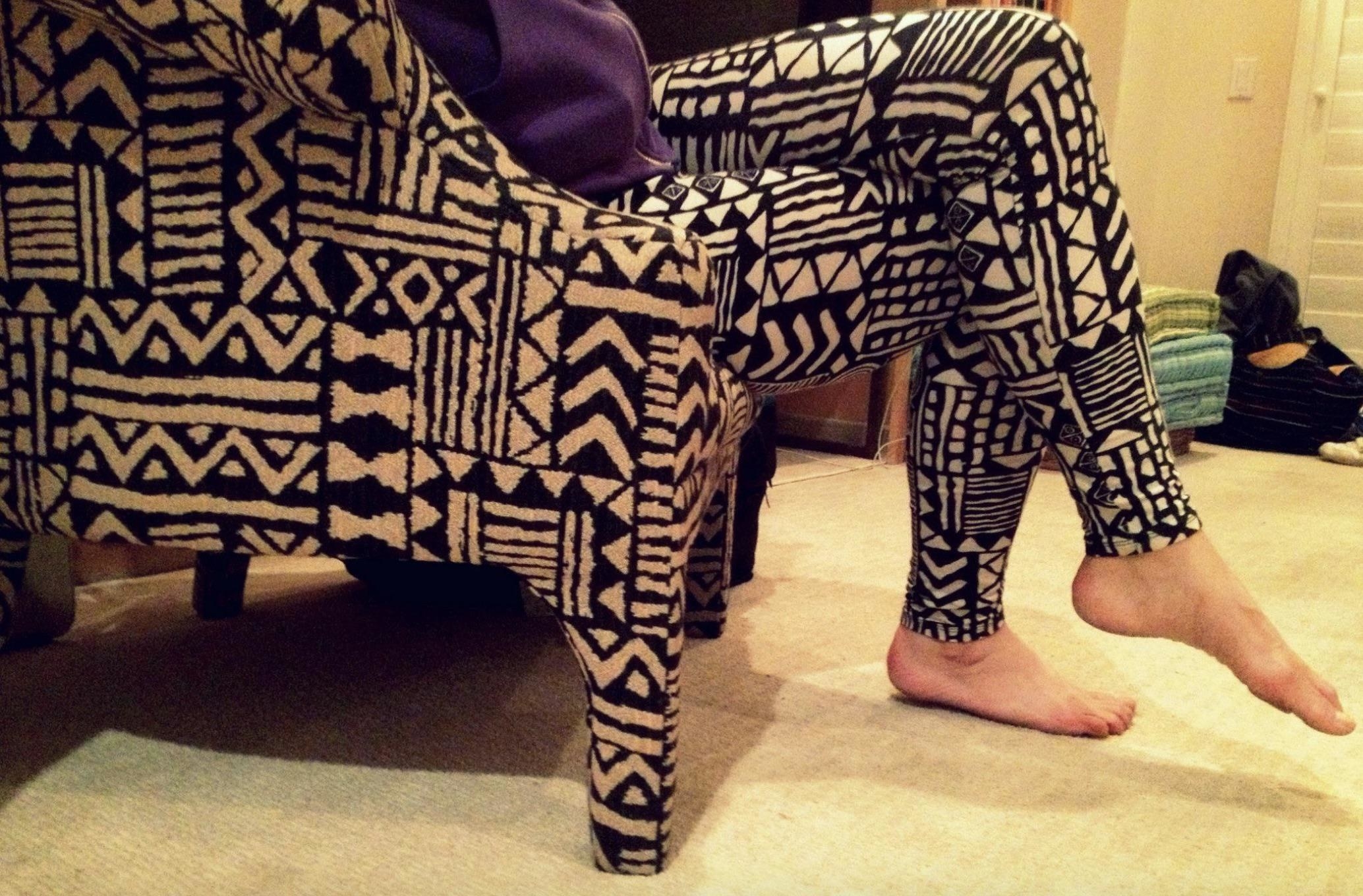 Someone&#x27;s leggings matching a chair