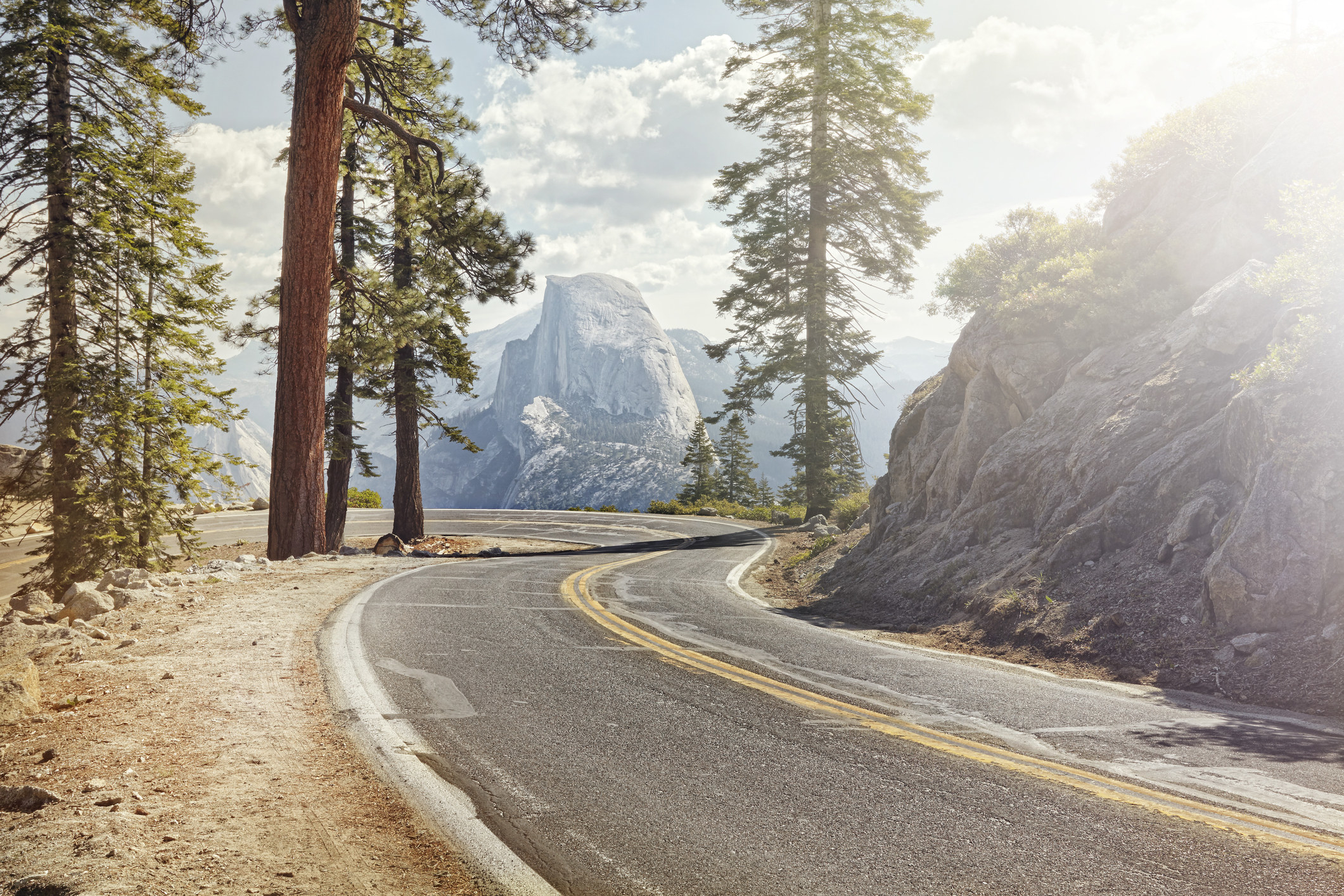 Winding road with Half Dome in Yosemite