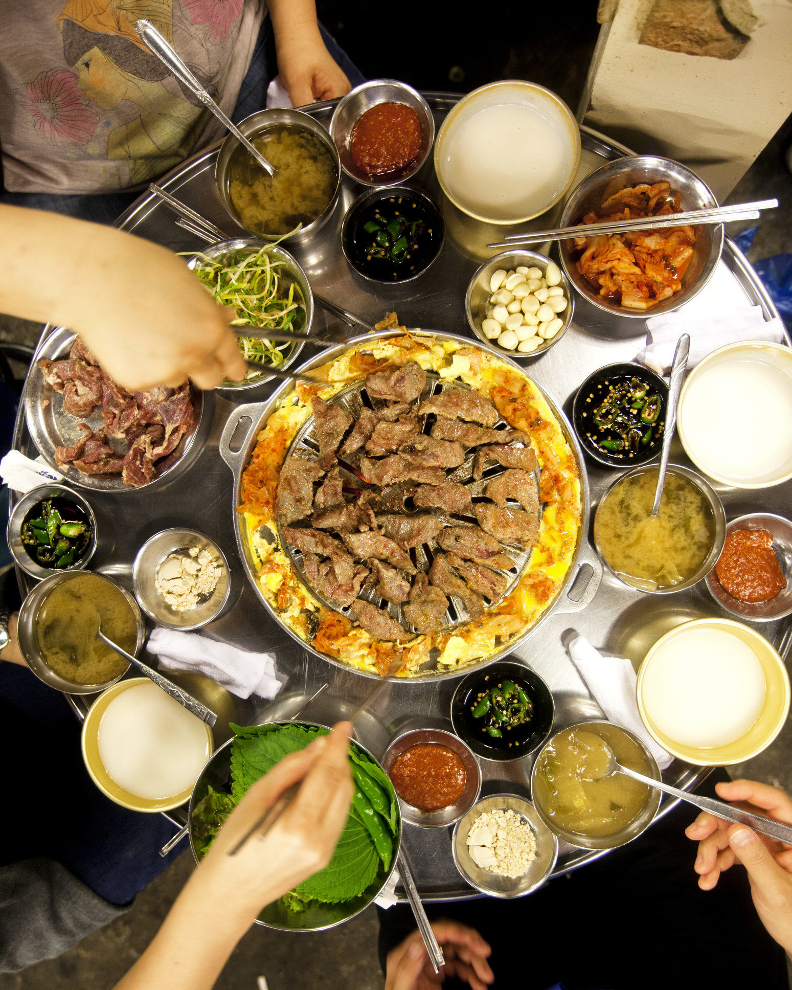 People eating Korean BBQ