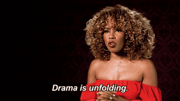 woman saying &quot;drama is unfolding&quot;