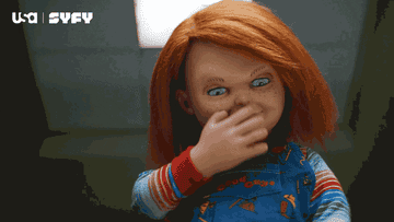 Chucky blowing a kiss and waving