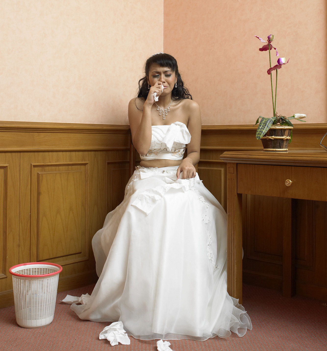 Woman sadly crying on her wedding day