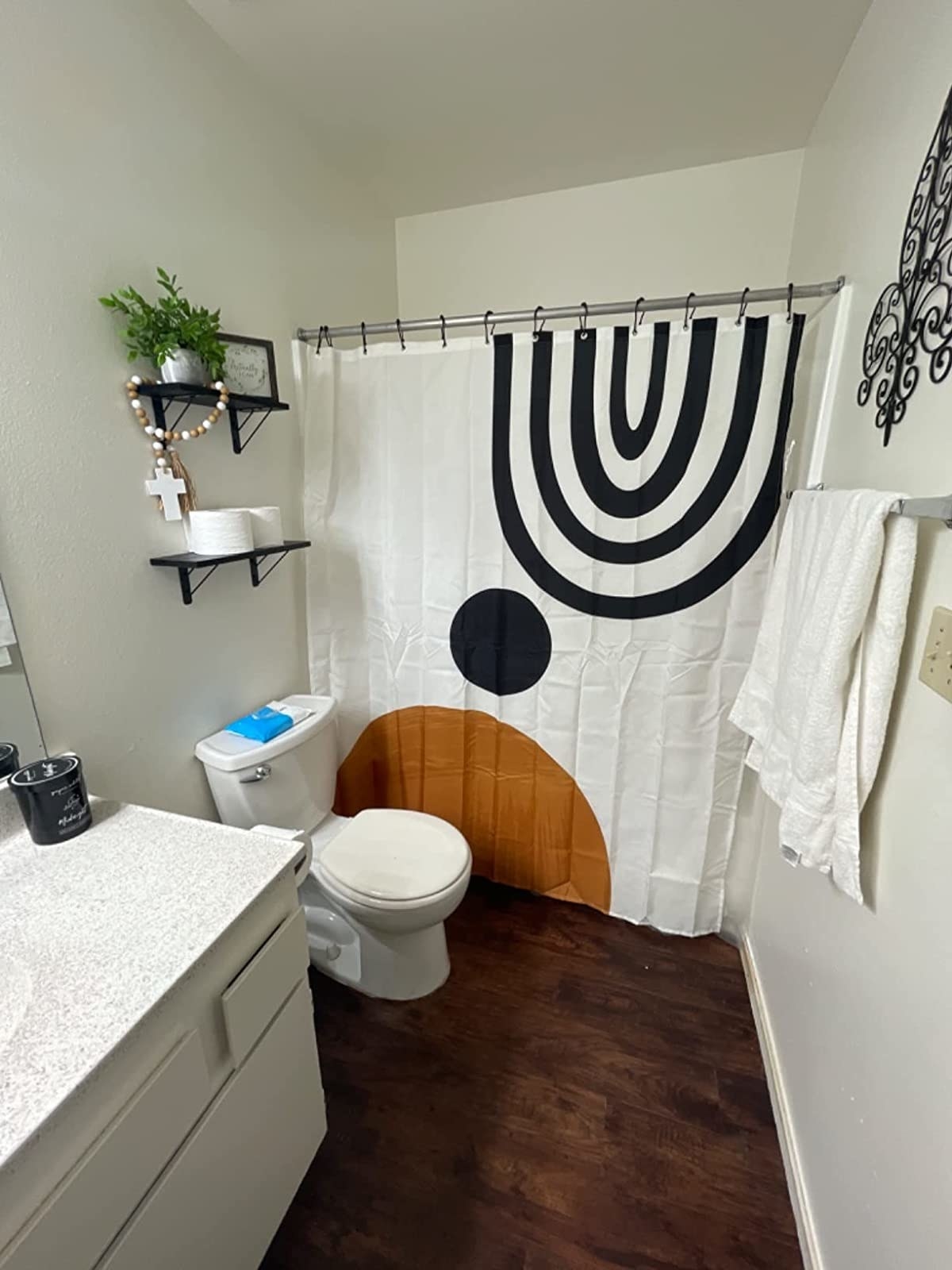 Reviewer&#x27;s photo of the shower curtain in the design Boho Mid Century