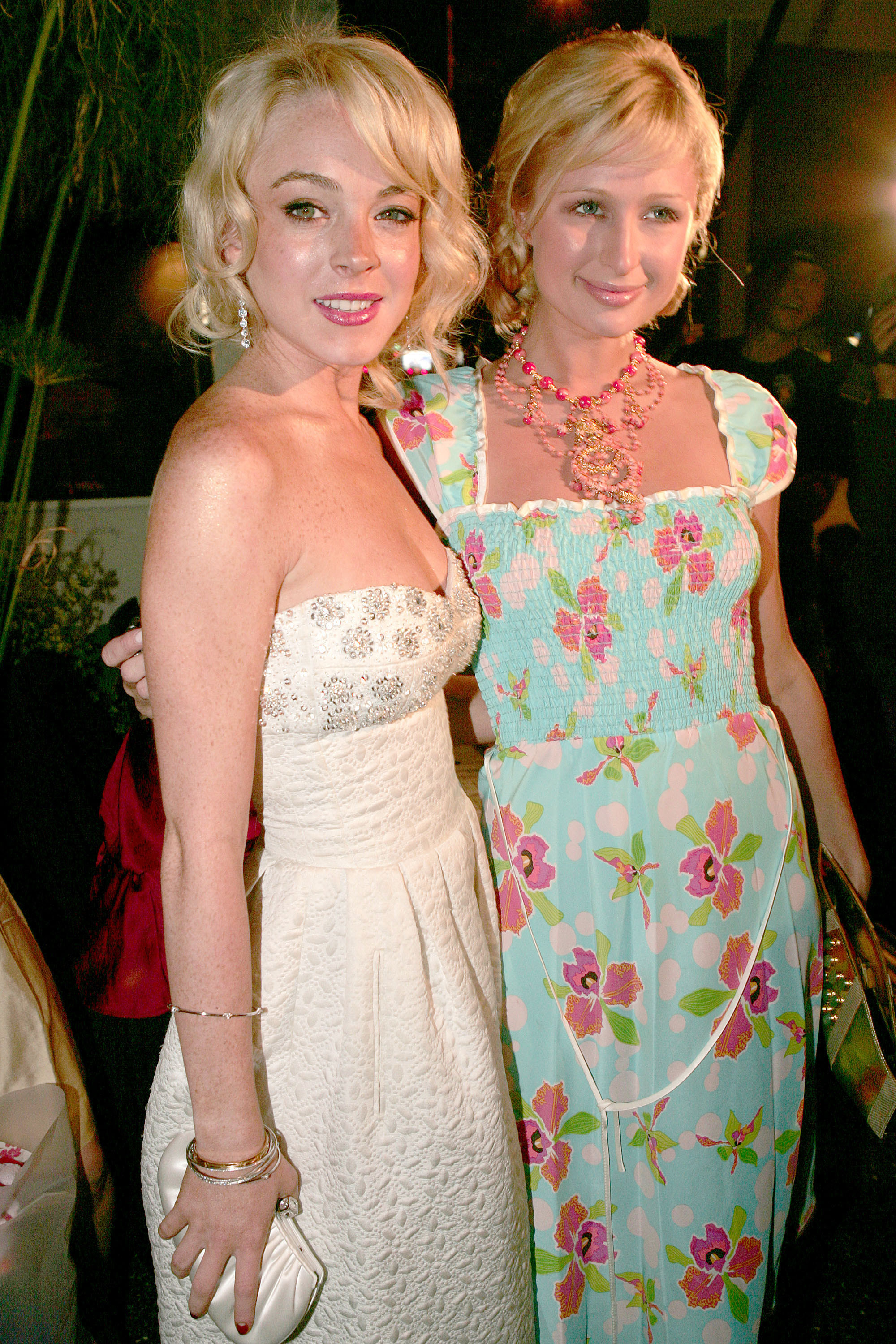 in a strapless dress with blonde hair