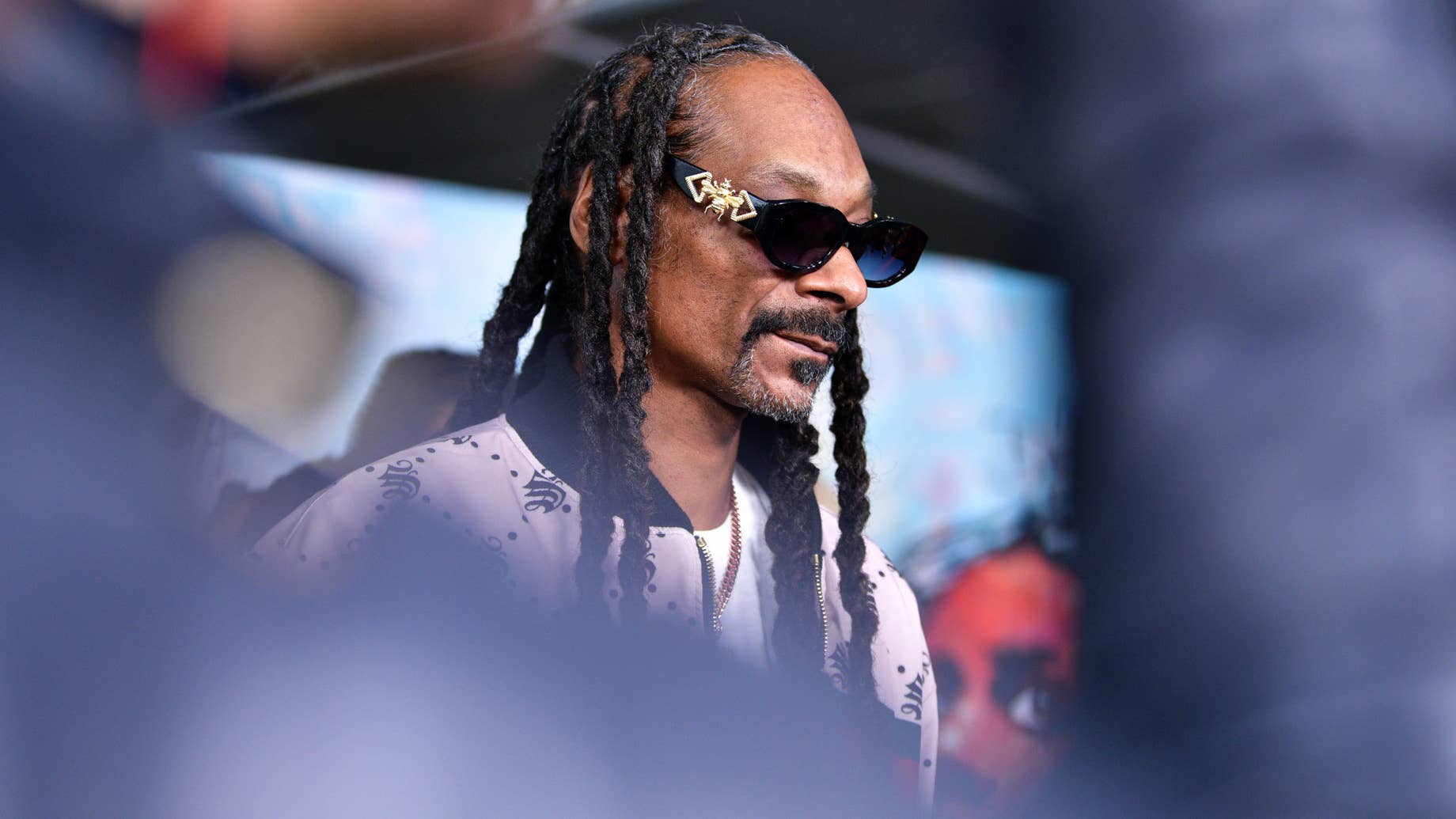 Snoop Dogg Responds to AI Pairing of “Gin and Juice” and “Bare