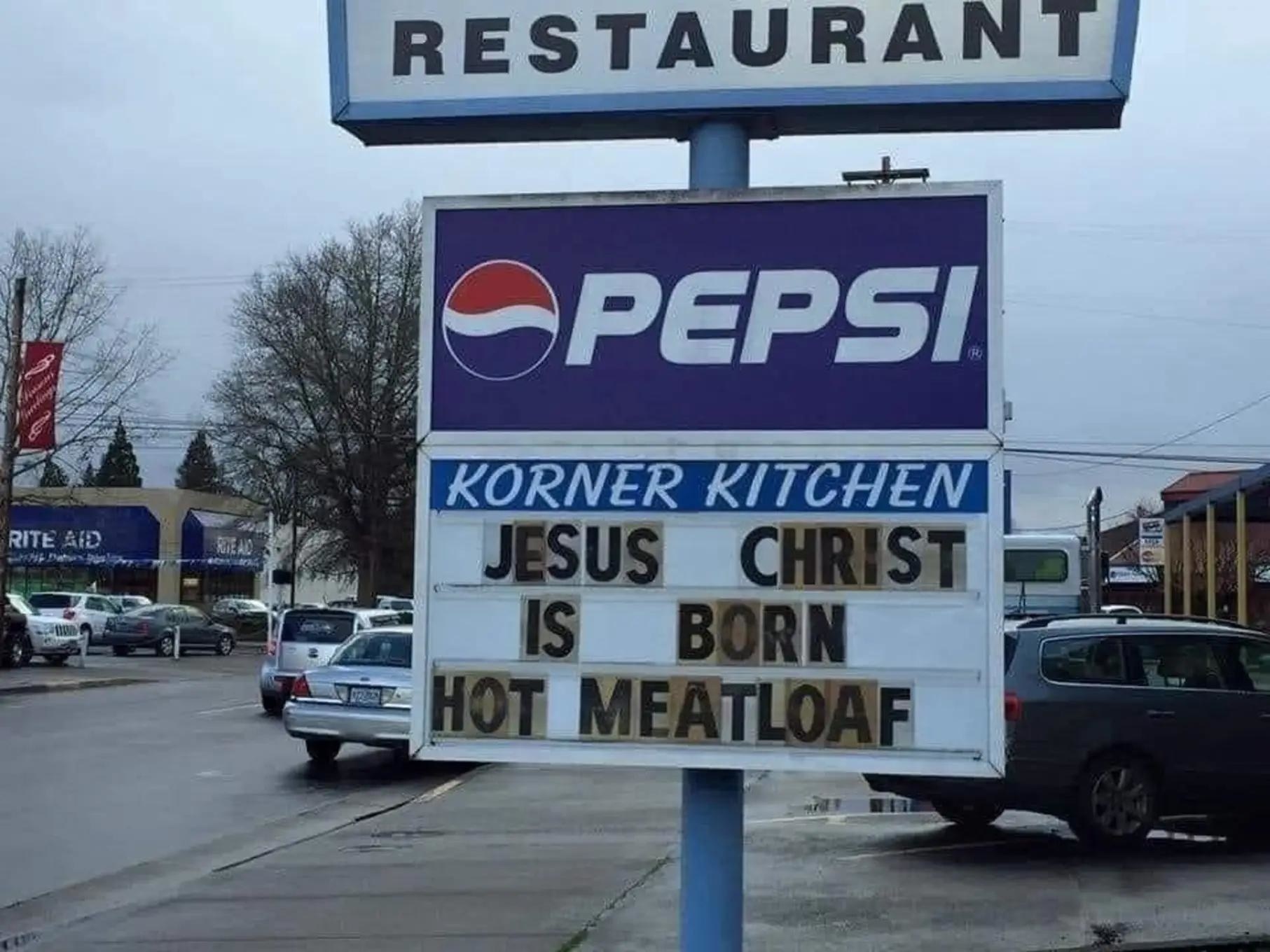marquee sign says, jesus christ is born hot meatloaf