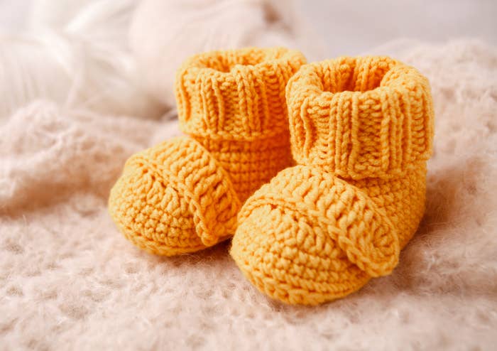 A closeup of knitted booties
