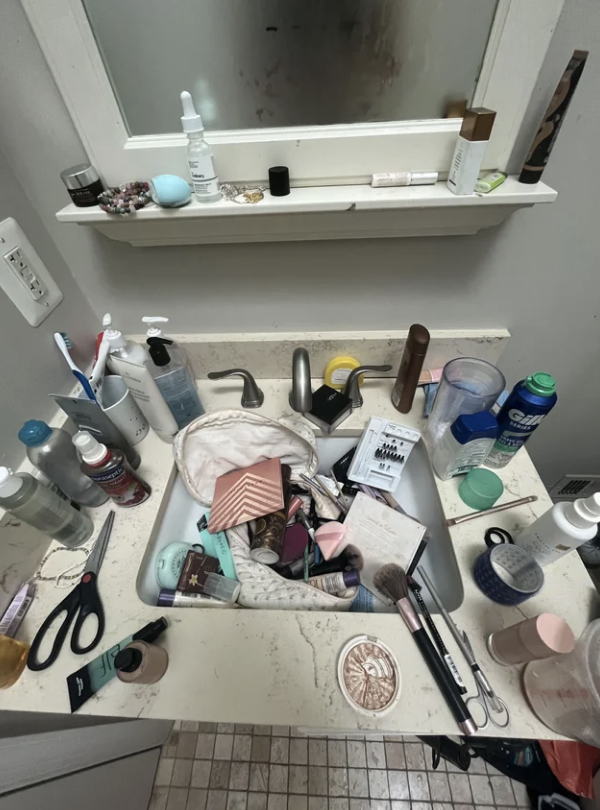 makeup on every inch of the counter and in the sink