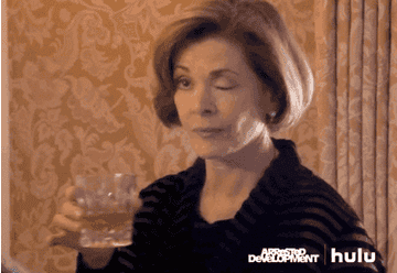 Lucille Bluth winking with a glass of alcohol on &quot;Arrested Development&quot;
