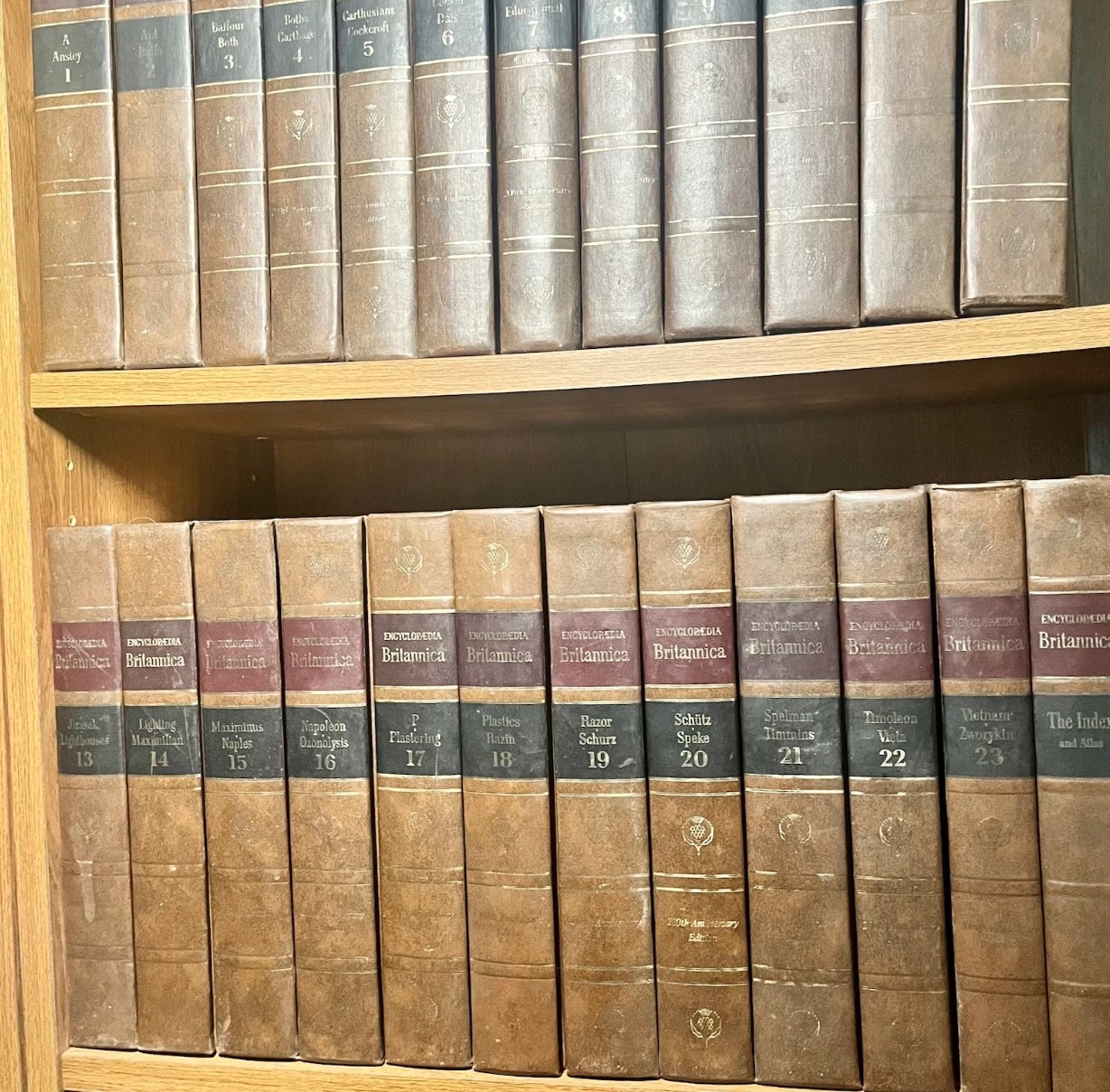 An Encyclopedia Britannica set from 1970 sits on a shelf