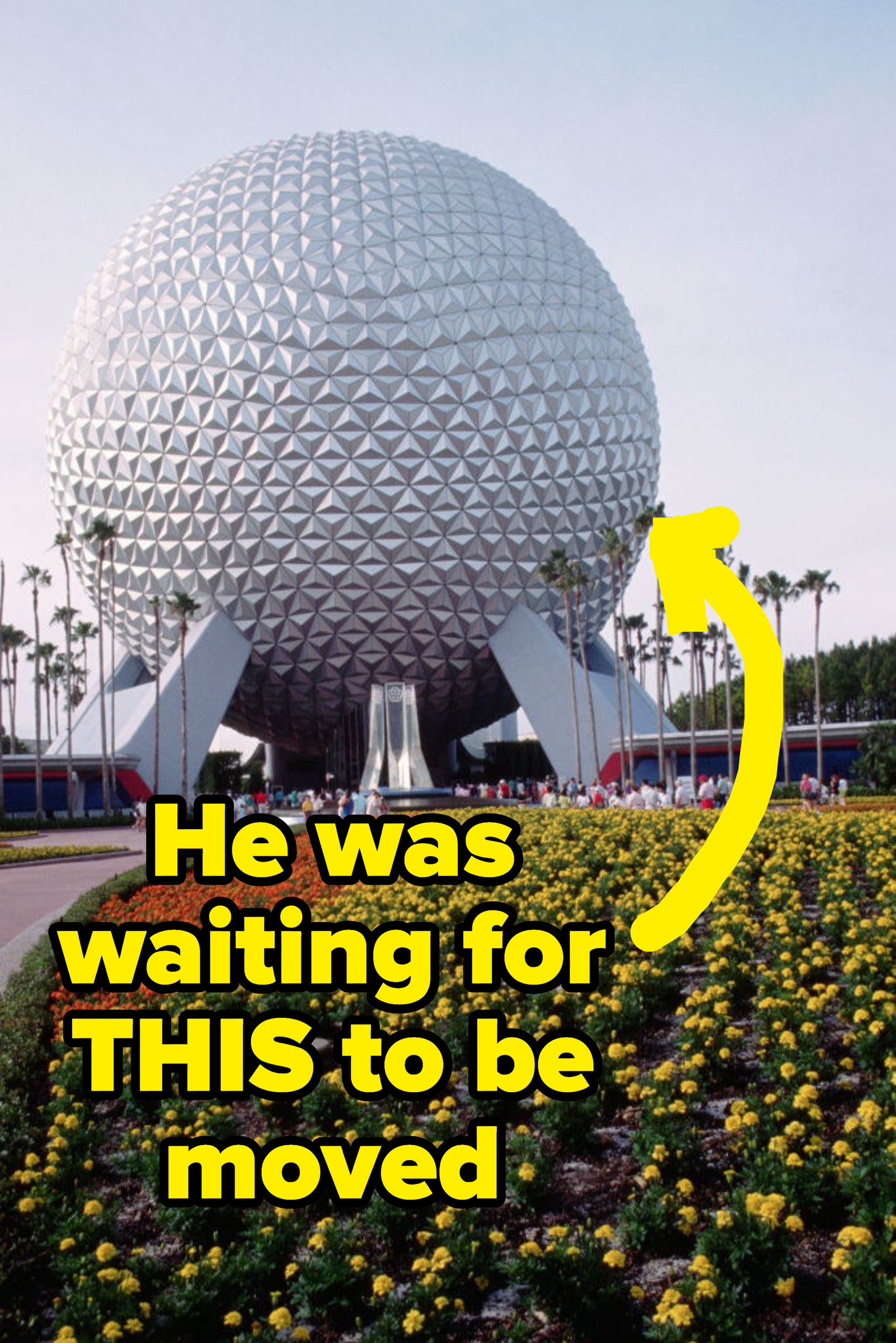 arrow pointing to the large golf ball sculpture that was supposed to be moved