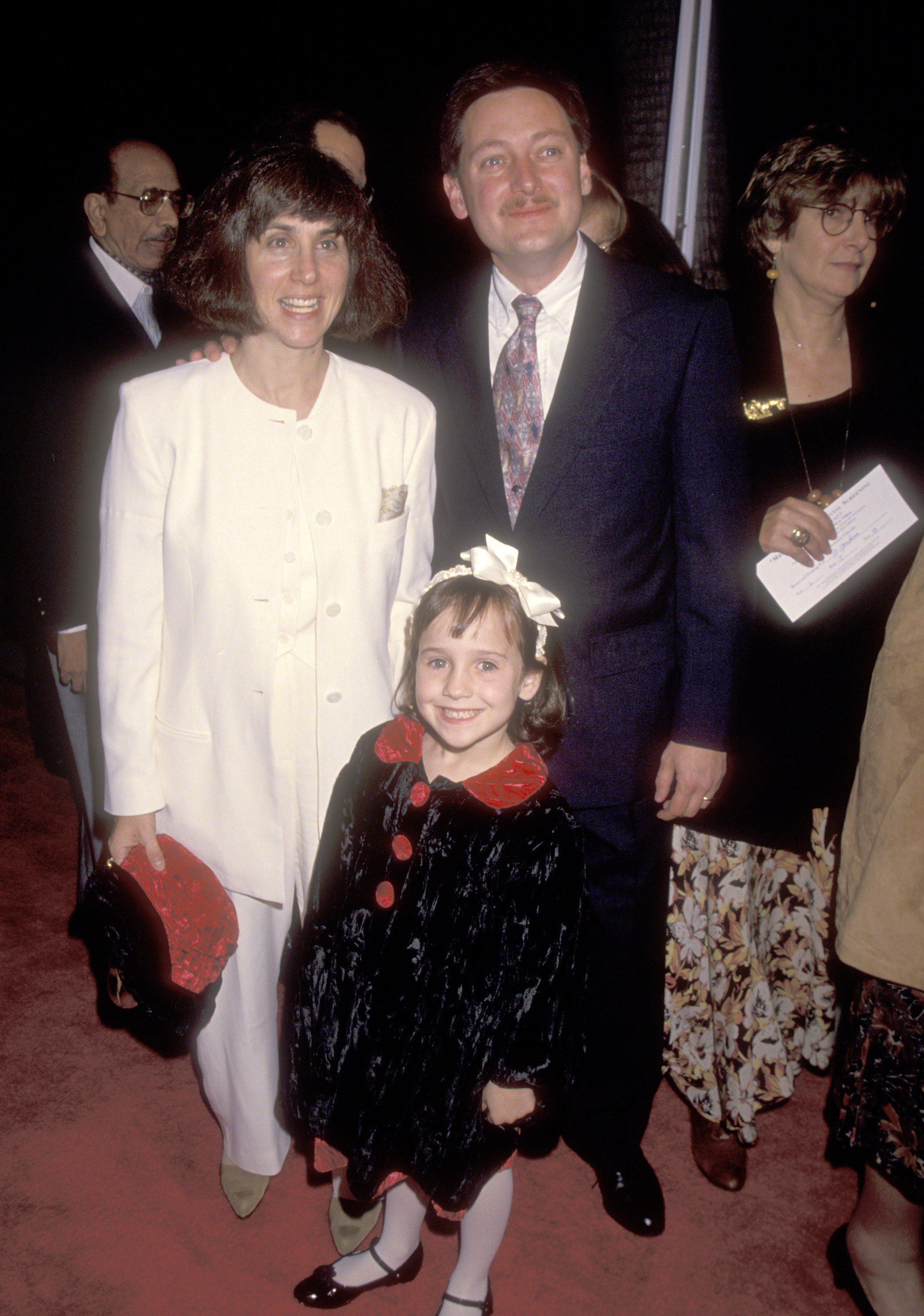 young mara with her parents on the red carpet