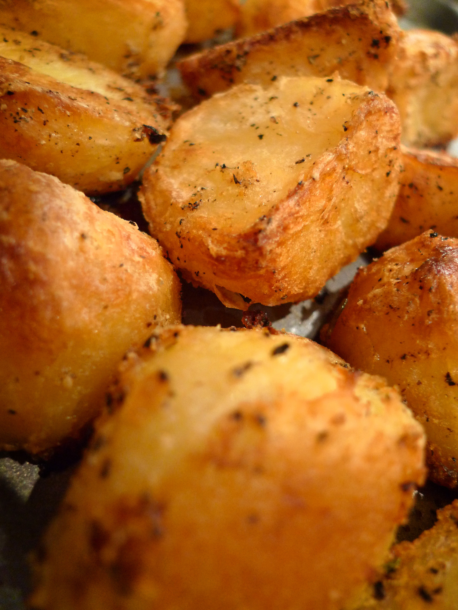 Close up of crispy roast potatoes.