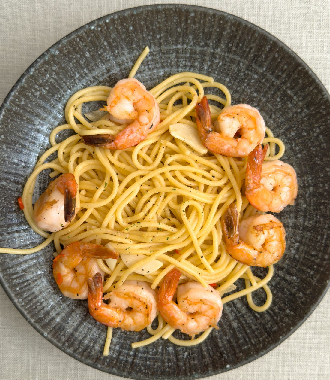 A plate of shrimp pasta.
