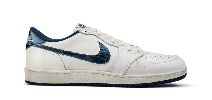 The lateral side of the Air Jordan 1 Low 'Metallic Blue'